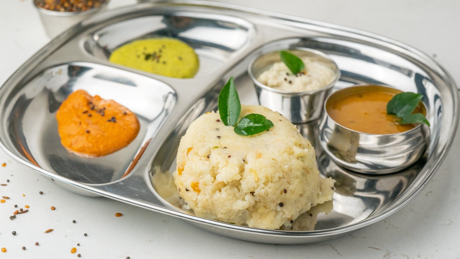 Fluffy and spiced Upma served at Sangam Vegetarian Restaurant