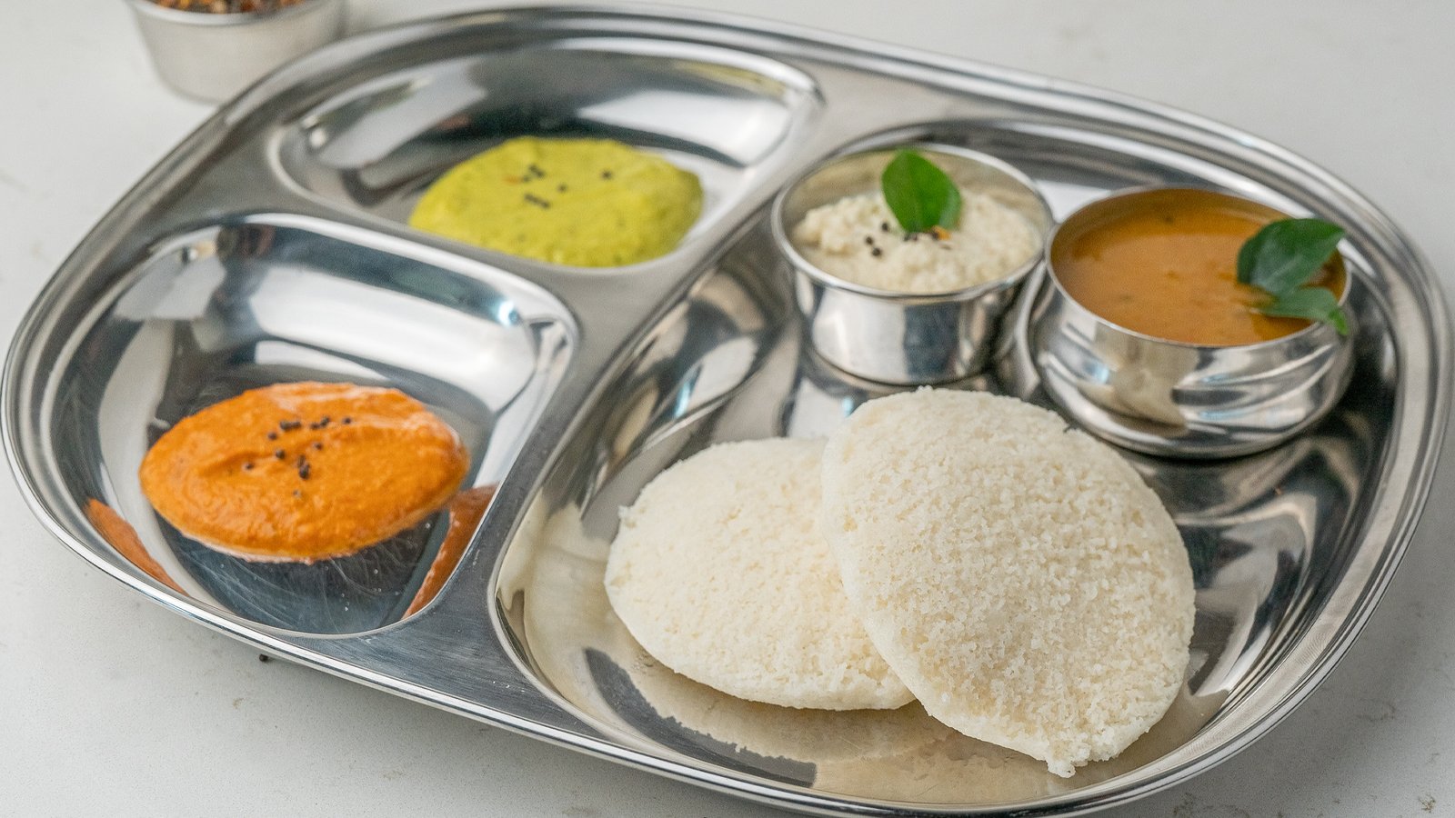 Soft and fluffy Idly served at Sangam Vegetarian Restaurant
