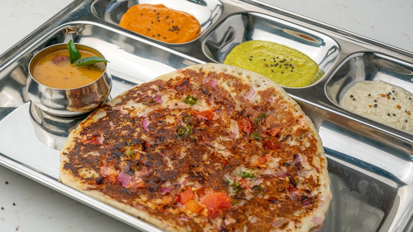 Onion, Tomato, and Onion Tomato Chilly Uttapam served at Sangam Vegetarian Restaurant