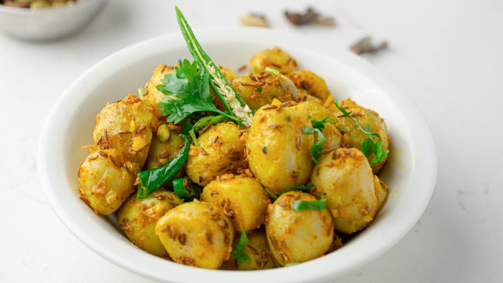 Spicy and tangy Aloo Chatpatta served at Sangam Vegetarian Restaurant