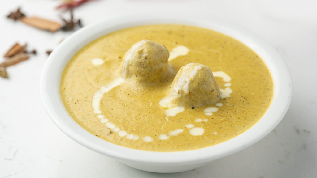 Malai Kofta Indian curry with soft dumplings in creamy gravy at Sangam Vegetarian Restaurant Dubai